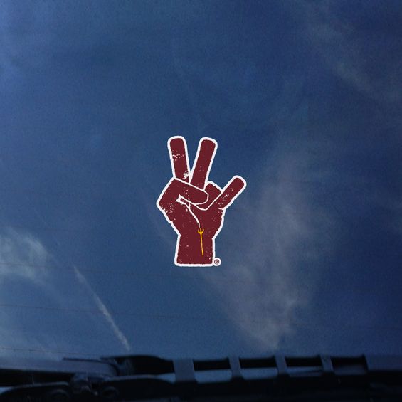 ASU decal of maroon hand making the pitchfork sign and a gold pitchfork on wrist