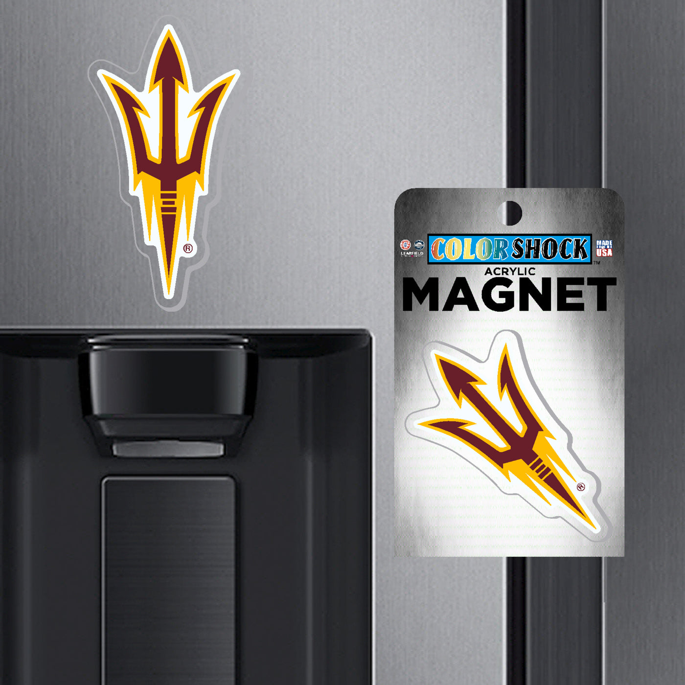 ASU pitchfork magnet on a fridge and another in packaging