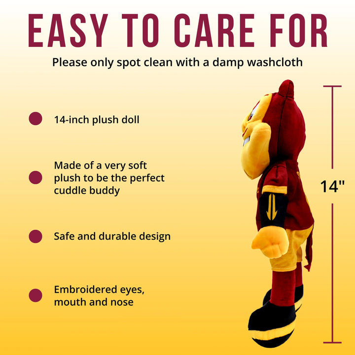 14-inch plush doll with care instructions on a yellow background