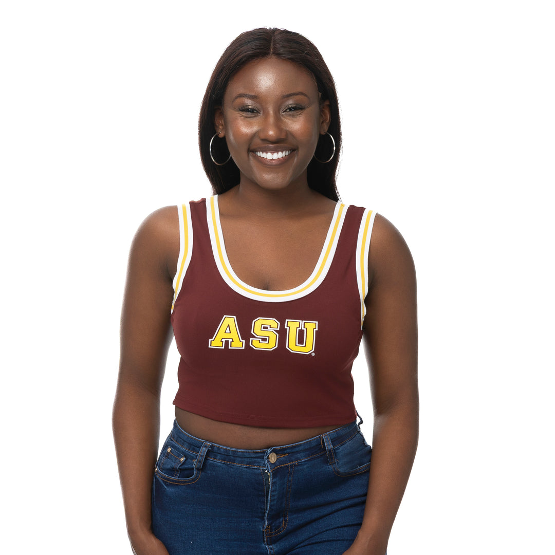 Woman wearing a maroon tank top with 'ASU' on it against a white background