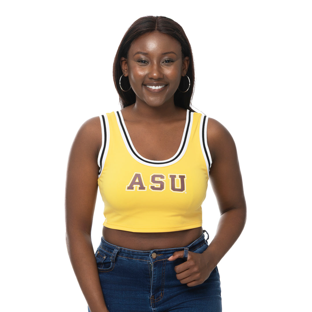 Woman wearing a yellow 'ASU' tank top on a white background