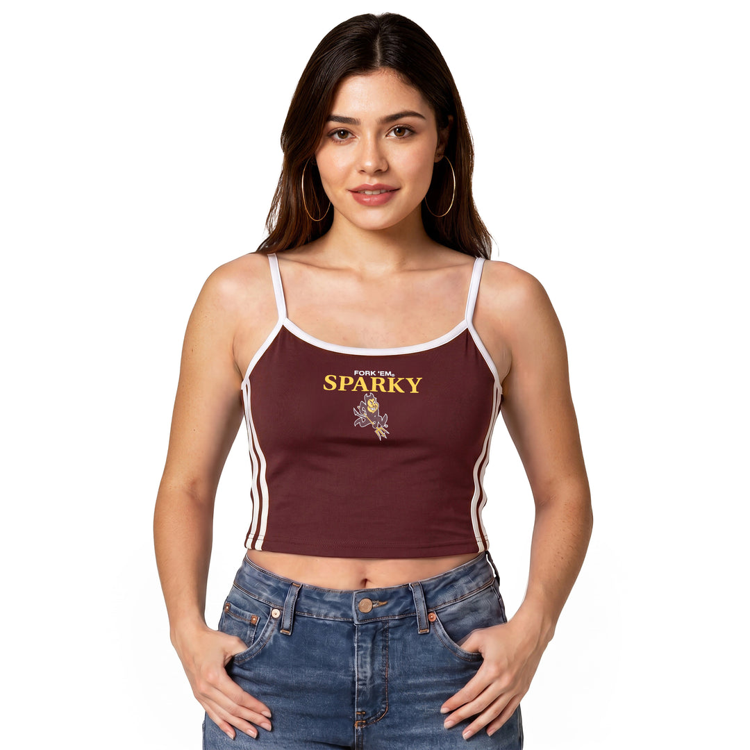 A woman modeling a maroon ribbed spaghetti-strap crop top with white trim, white side stripes, and a yellow &