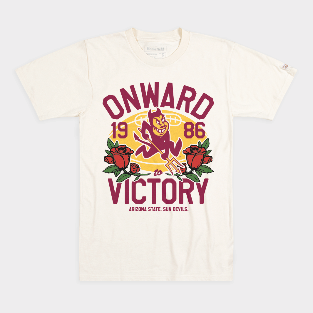 An off-white short-sleeve t-shirt featuring a vintage-style graphic print for Arizona State Sun Devils. The graphic displays the words &