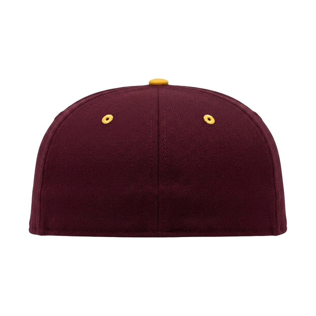 Maroon baseball cap with yellow buttons on a white background