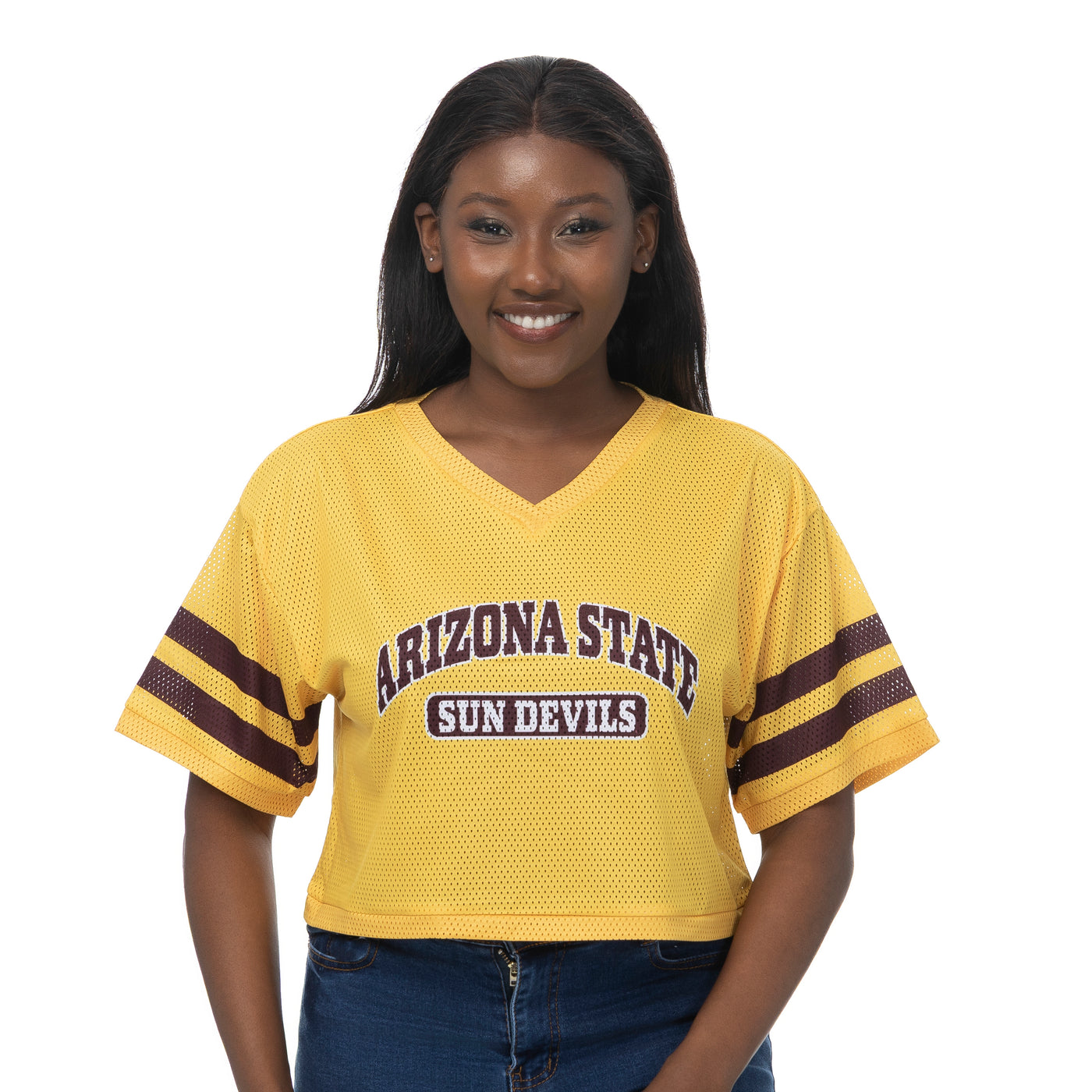 Woman wearing a yellow Arizona State Sun Devils jersey on a white background