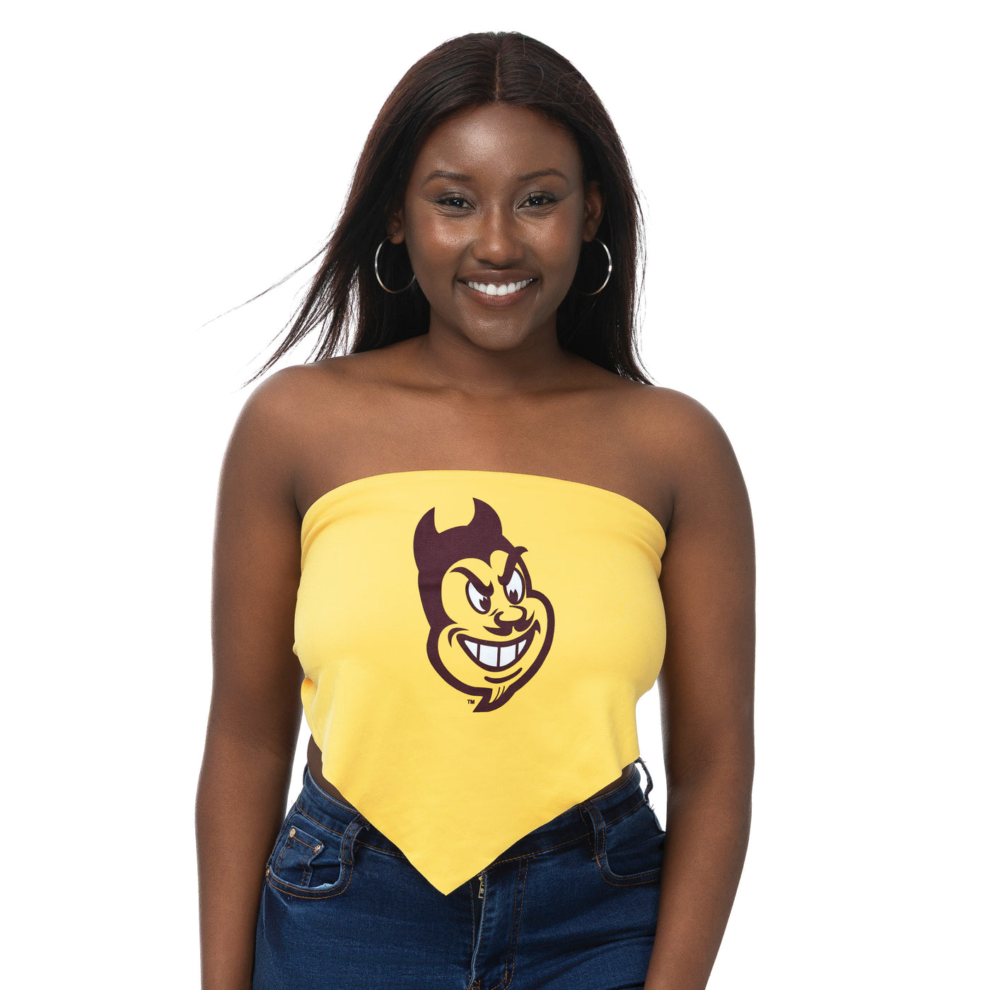 Woman wearing a yellow strapless top with a logo on a white background