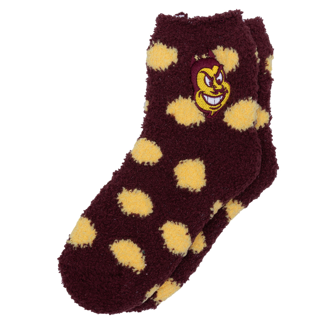 A pair of plush fleece ankle socks in maroon and yellow, featuring a cartoon mascot face patch on the cuff, shown against a plain white background.