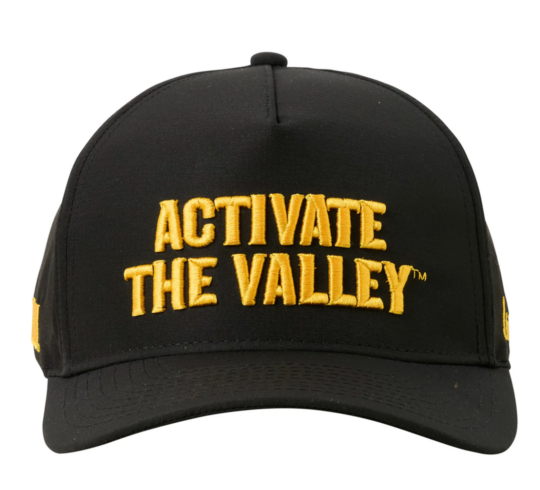 Black cap with 'Activate The Valley' text in yellow on a white background