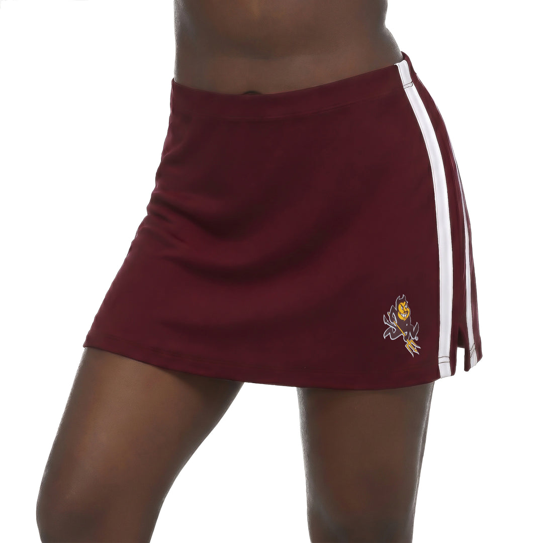 A maroon athletic mini skirt with white side stripes and a Sparky logo, shown on a model against a white background.