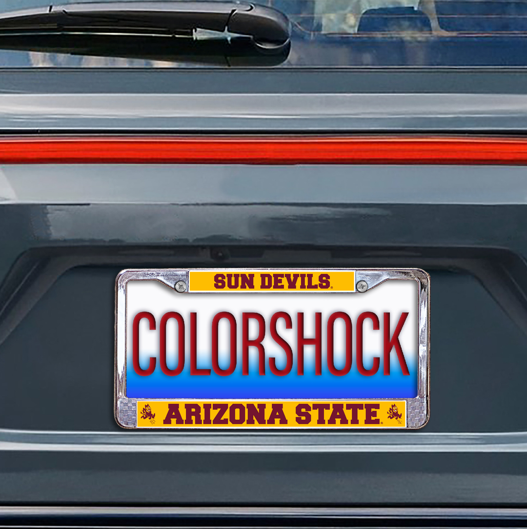 license plate frame that reads "Sun Devils" across the top and "Arizona State" at the bottom with Sparky on either side. Text is maroon and background color is gold. 