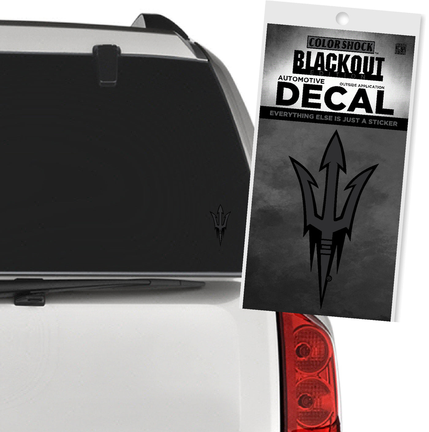 Blackout decal of a logo on a car's rear window with packaging.