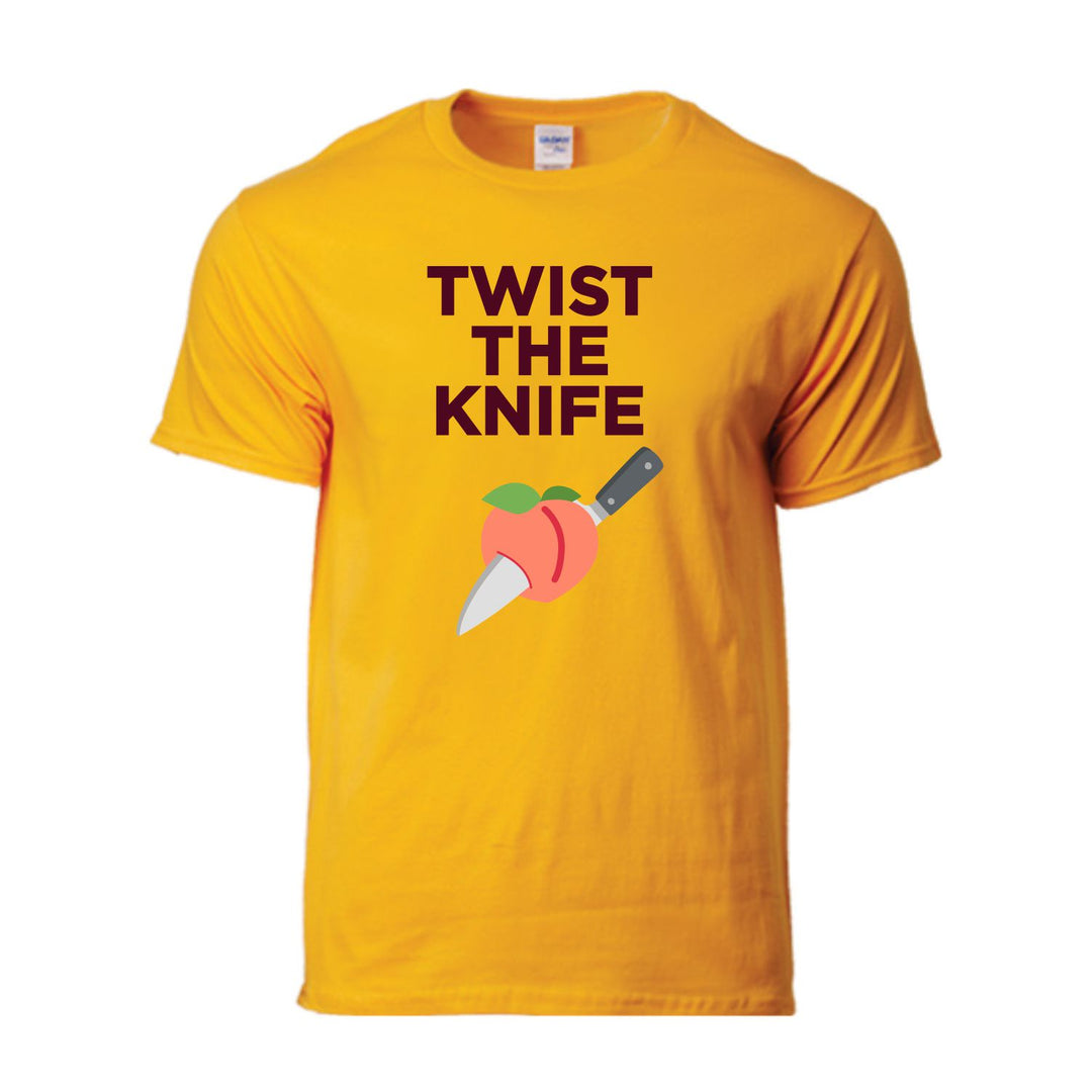 Gold short sleeve tee with "Twist the Knife" in maroon stacked letters above peach with knife through it