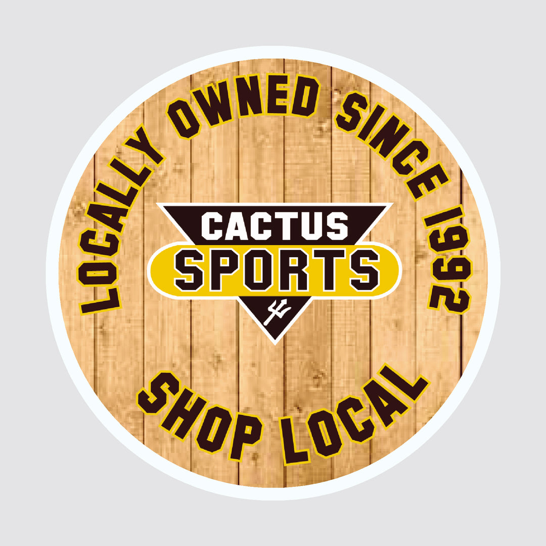 Circular magnet with white outline and wooden background, Cactus Sports logo in the center, "Locally owned since 1992 shop local" around it.