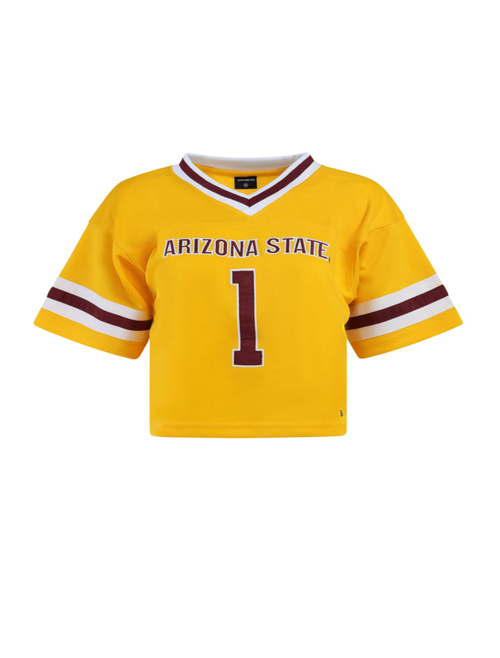 Cropped short sleeve v-neck jersey in gold. Maroon and white stripe detailing on the collar and sleeves. Text reads &
