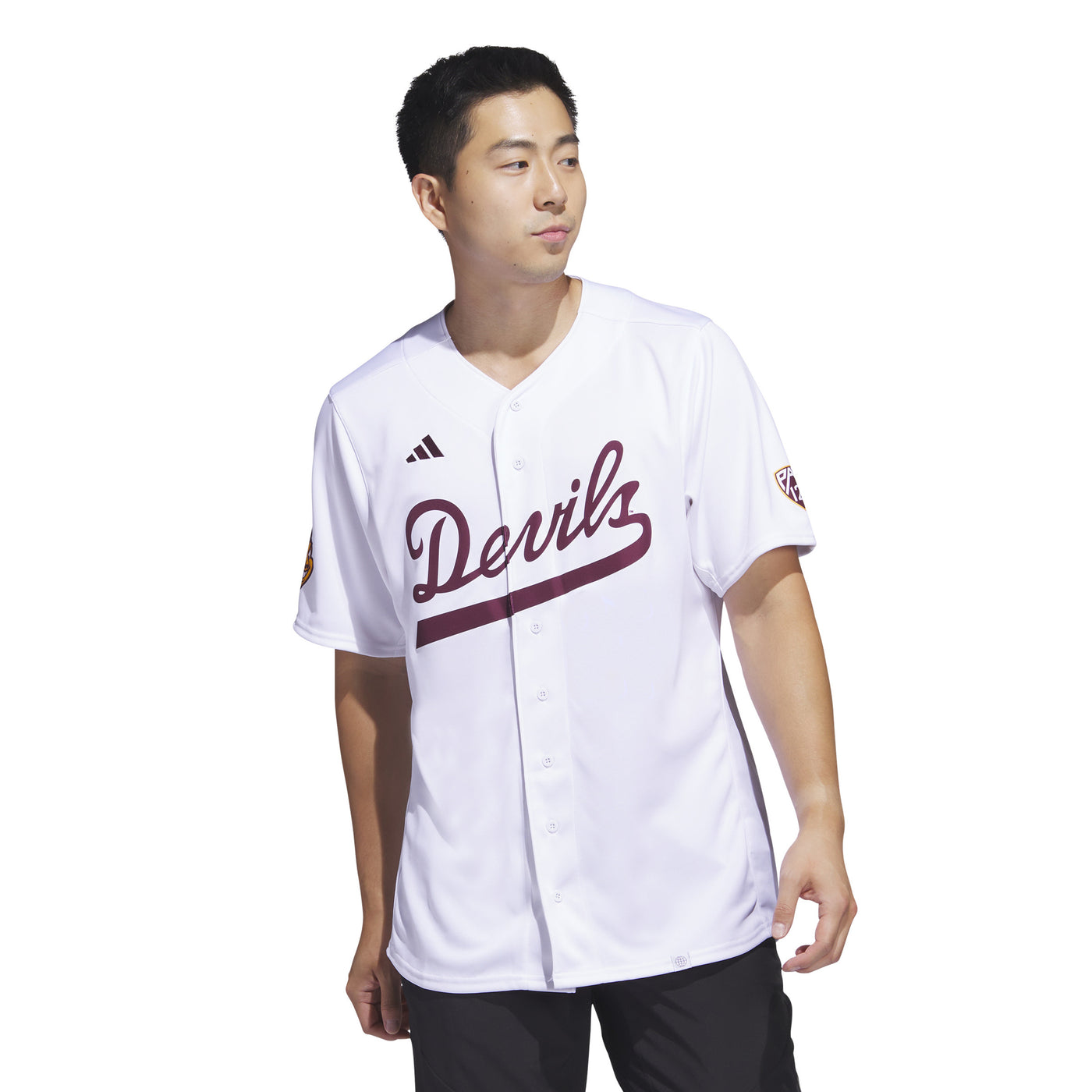 Photo of man wearing an ASU white baseball jersey with 'Devils' lettering across the chest