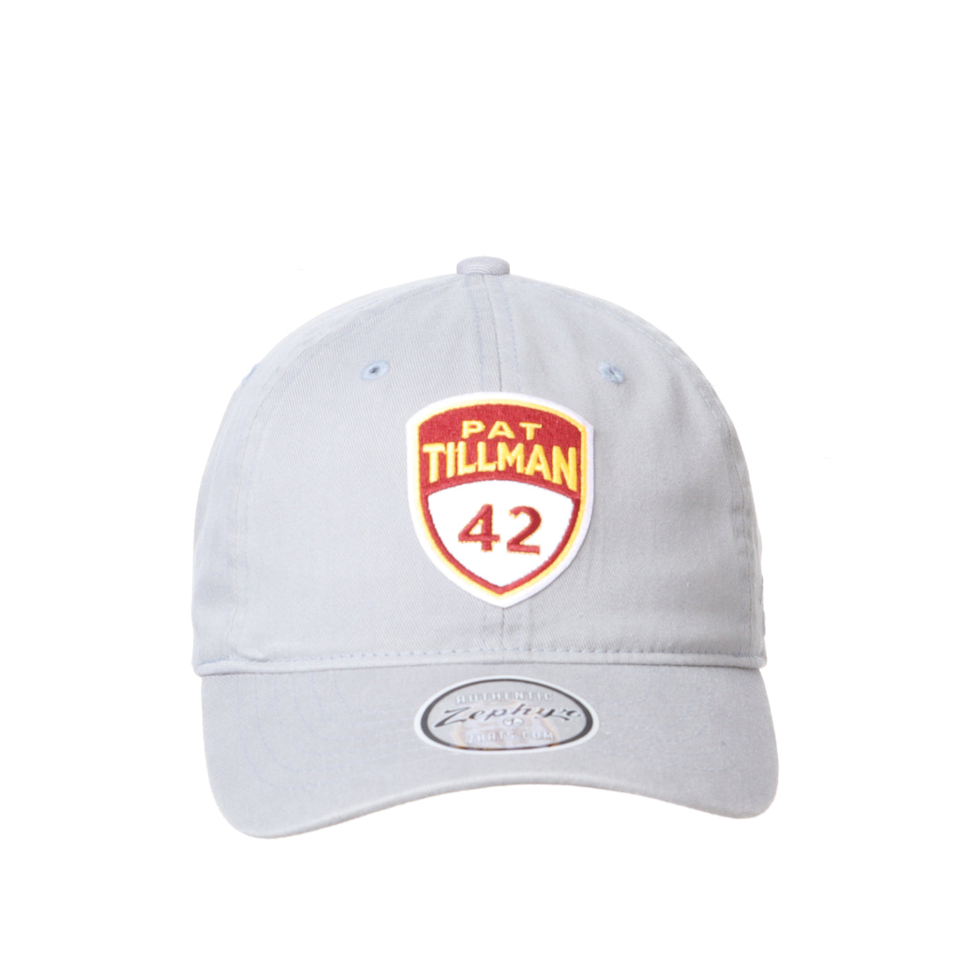 Shows the front of a light gray hat with a Pat Tillman shield on the front with a 42.