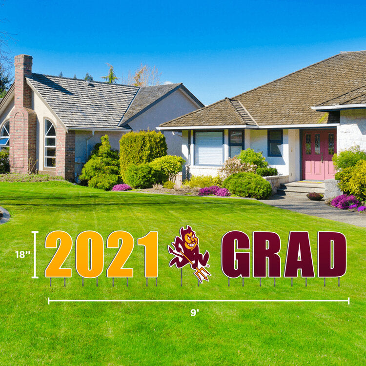 ASU lawn sign in front of house saying '2021 Grad' with Sparky in the middle