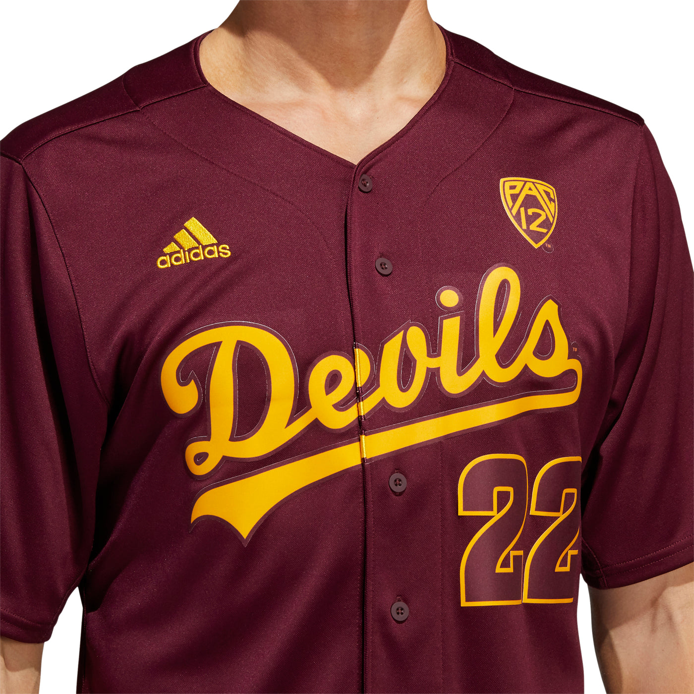 Close up image of ASU button down baseball jersey in maroon with Adidas logo on right chest, PAC12 logo on left chest, 'Devils' across the front above '22'
