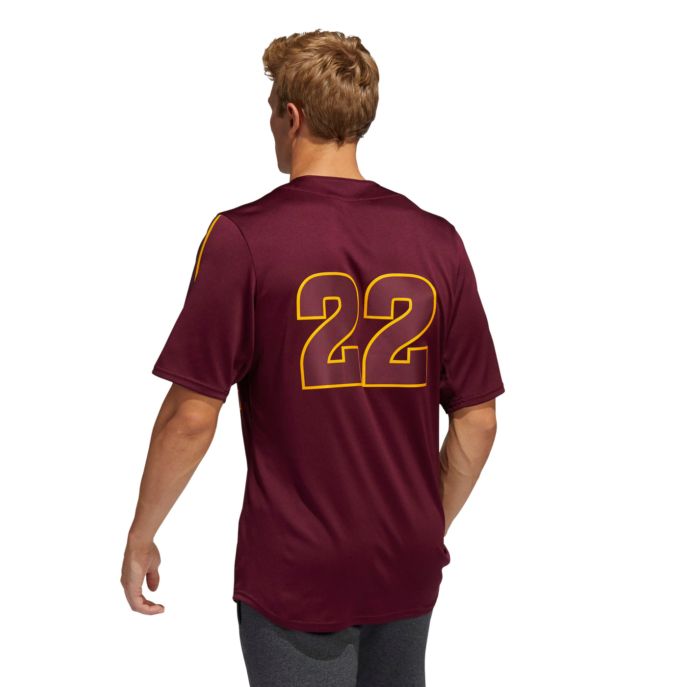 Back view of man wearing an ASU maroon baseball jersey with '22' on the back