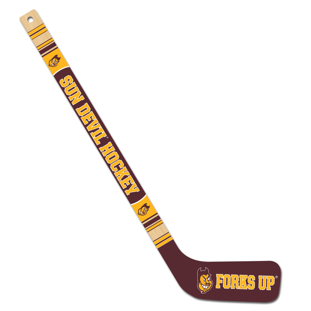 ASU Small wooden miniature hockey stick . various patterns of gold and maroon stripes all down the stick. At the bottom it is maroon with the text "Forks Up" in gold outlinted in white with a sparky mascot head. Vertically down the handle is the text "Sun Devil Hockey" in gold outlined in white on top of a maroon background with a  small sparky face mascot on both ends of the text.