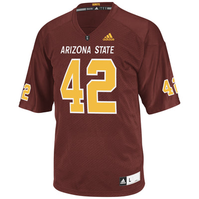 ASU maroon football jersey. Gold numbers 42 is on both sleeves and on the chest. Above the chest number is white text that reads Arizona State. Collar features the black PT 42 emblem. 