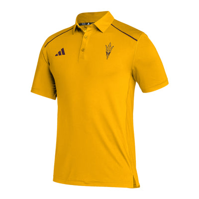 Mens gold polo with small pitchfork logo on chest. Maroon adidas logo on other side of chest. Two thin maroon line details on shoulders.